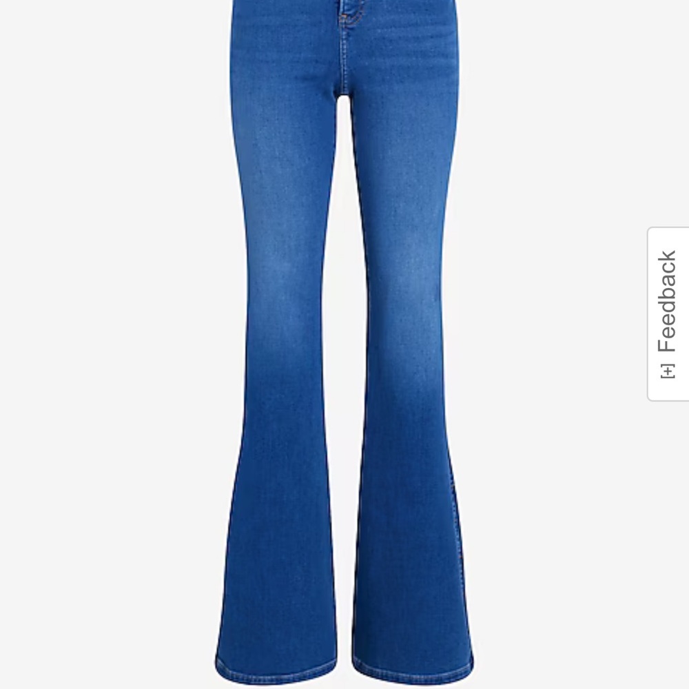 Mid Rise Medium Wash Slit Hem '70s Flare Jeans